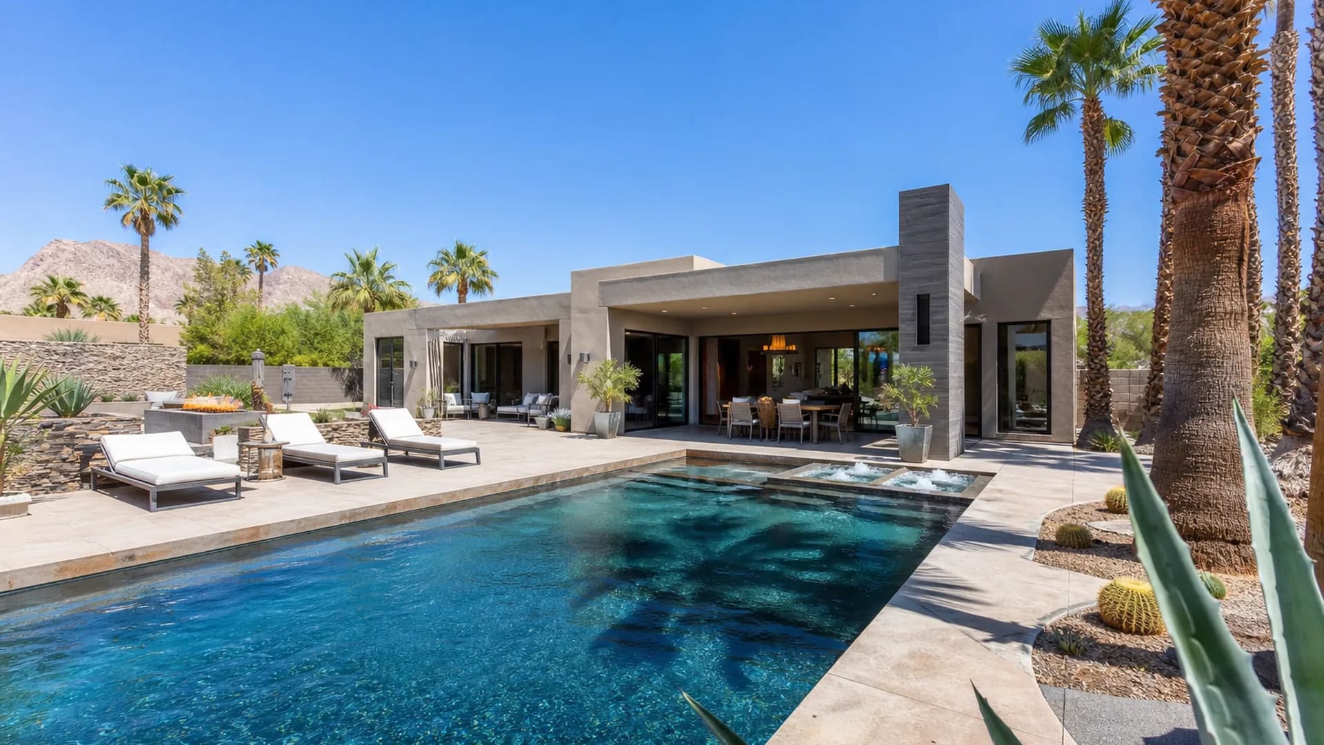 Modern Las Vegas desert home with pool under bright sunshine | Las Vegas Relocation Services Modern Las Vegas desert home with pool under bright sunshine